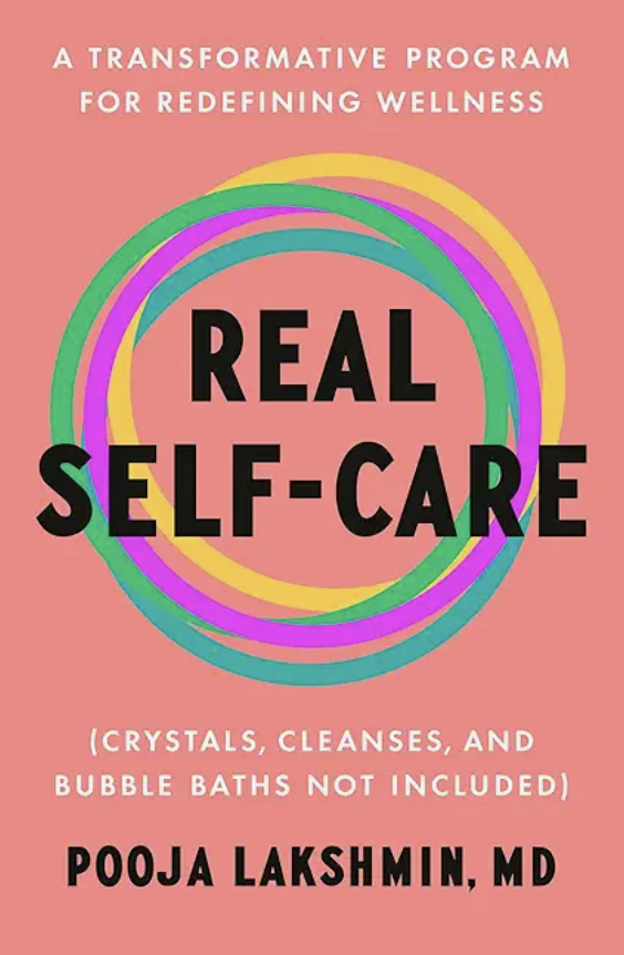 “Real self-care" written in a bold font with circles of different colours behind it. 