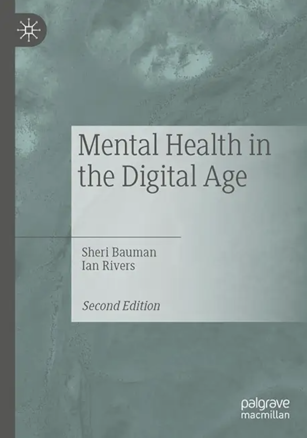 Blue background of a notepad, with "Mental Health in the Digital Age" written on the cover.