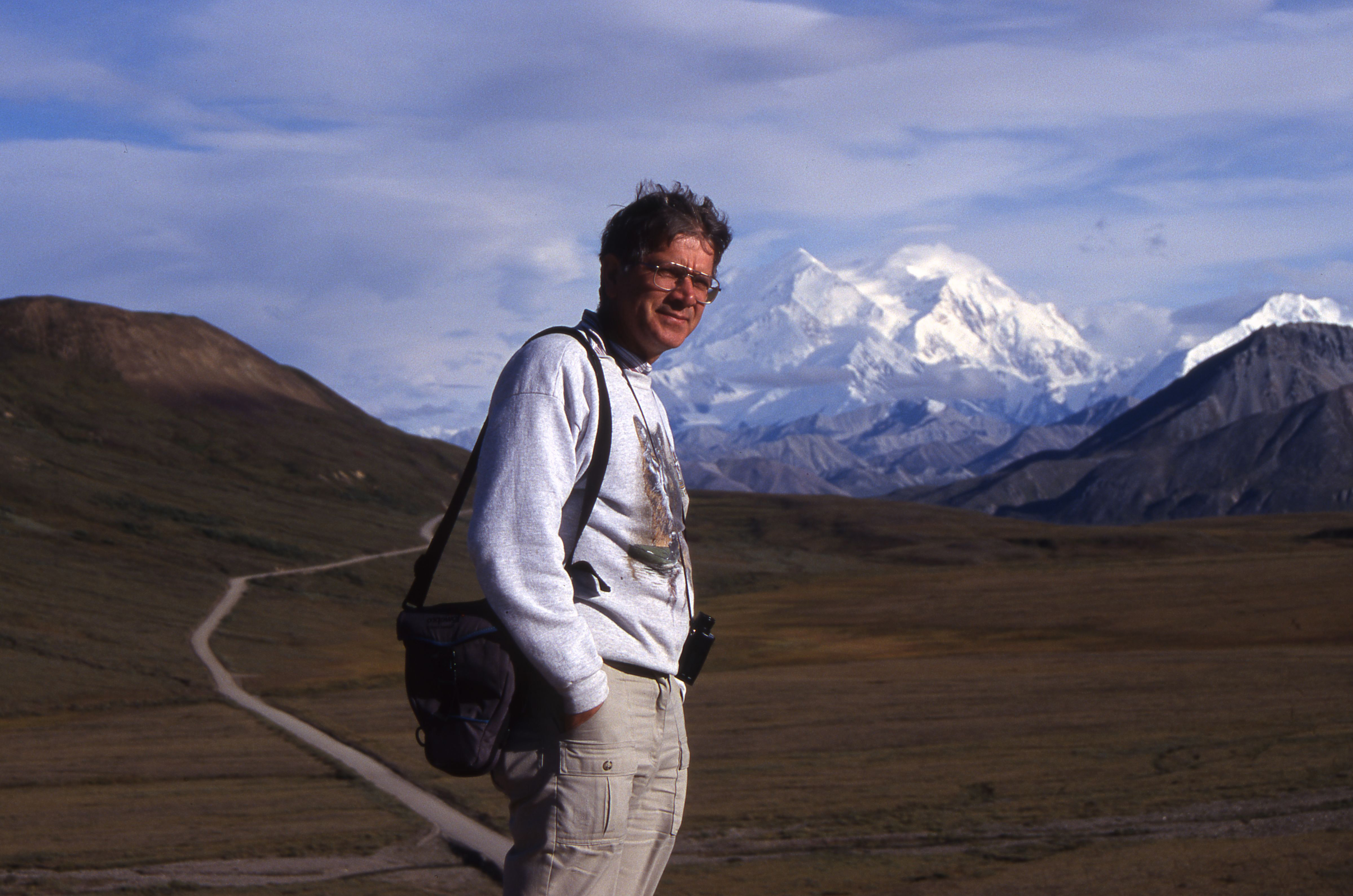 photo of Rudy Boonstra with mountains in the background
