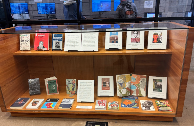 One of two vitrine cases at the front of the library, filled with a display.