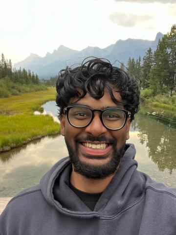 Headshot of Abejith Pratheepan. Emerging Professional in Software Development