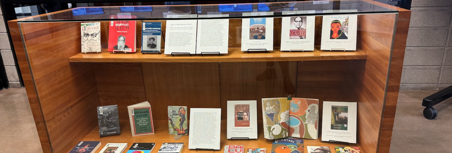 One of two vitrine cases at the front of the library, filled with a display.