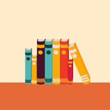 A row of colourful books on an orange border.